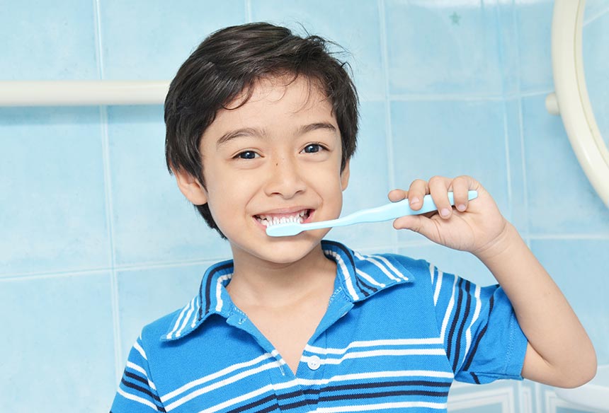 Child Brushing Teeth