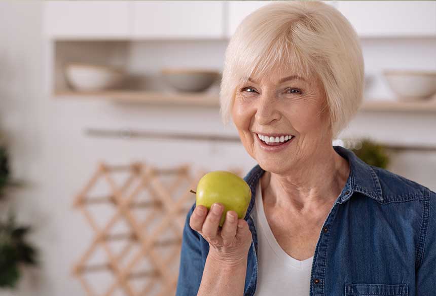 Eating Apple Dentures